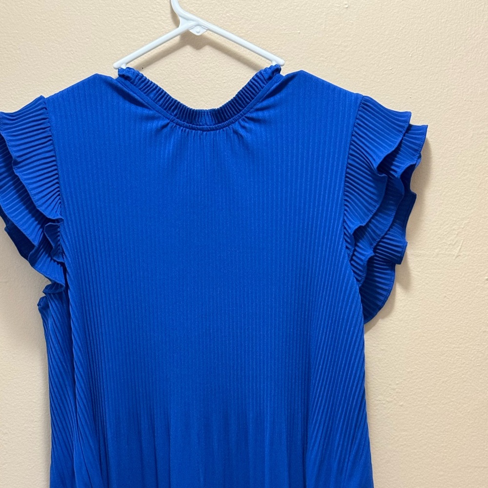 A blue short sleeve shirt